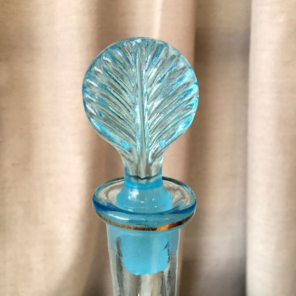 Turquoise blue liquor decanter and glass gild mold press of the 1950s