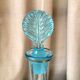 Turquoise blue liquor decanter and glass gild mold press of the 1950s