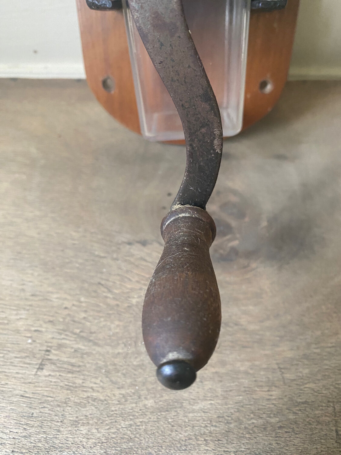 Old wall-mounted coffee grinder