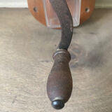 Old wall-mounted coffee grinder