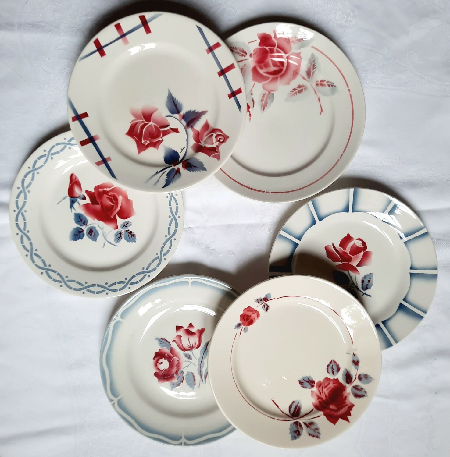 Old flat plates mismatched in earthenware