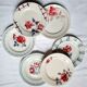 Old flat plates mismatched in earthenware