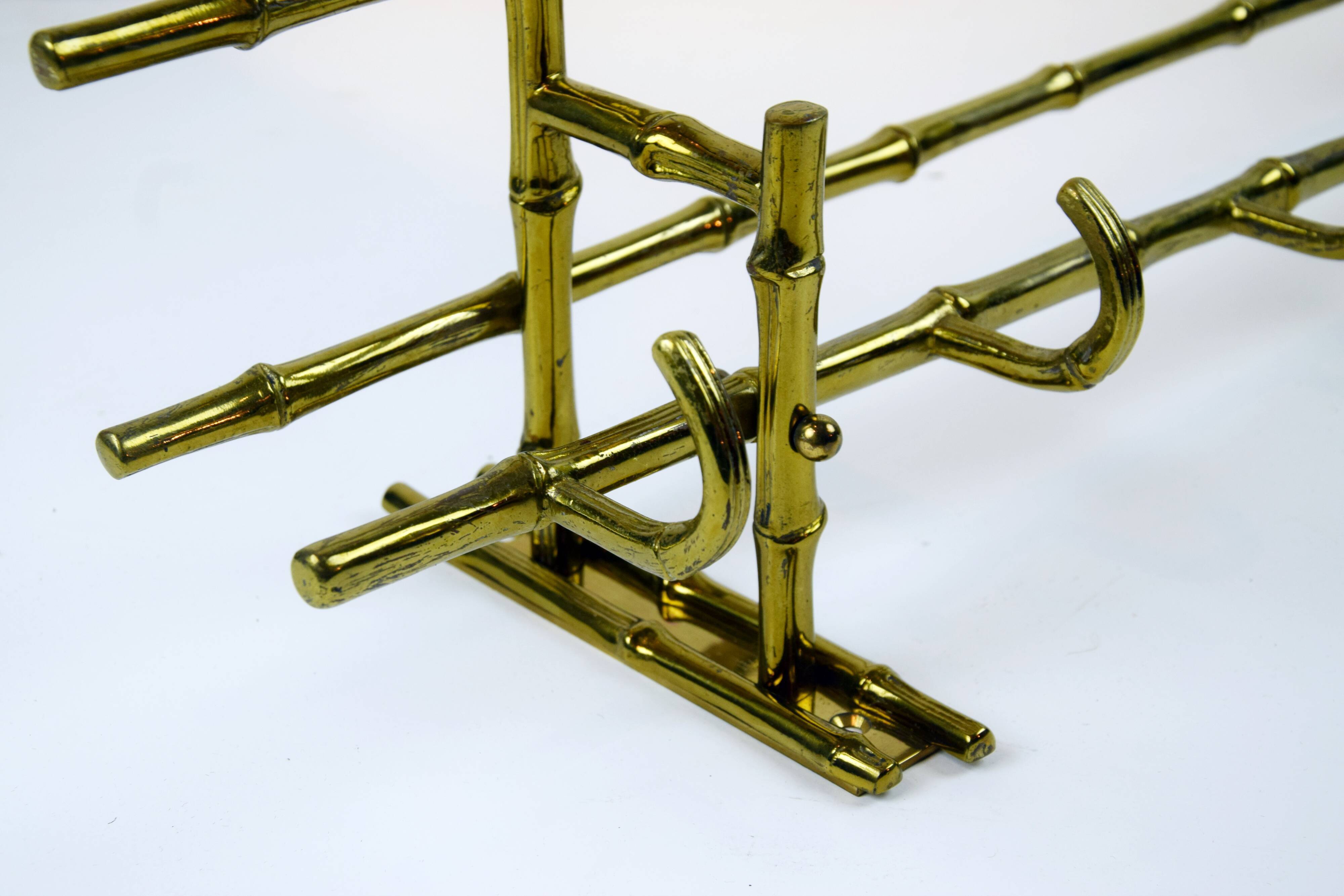 Bamboo-like coat rack in bronze