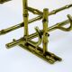 Bamboo-like coat rack in bronze