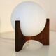Raak Amsterdam Hokusai D-2022 table lamp in wenge & opal glass