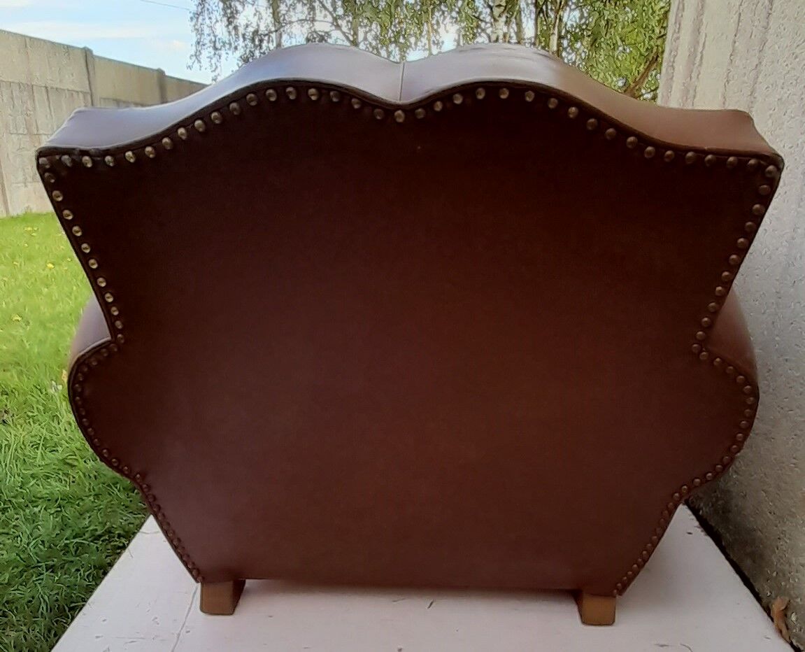 Club armchair in brown skai back mustache