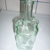Bouteille ancienne en verre moulée transparente