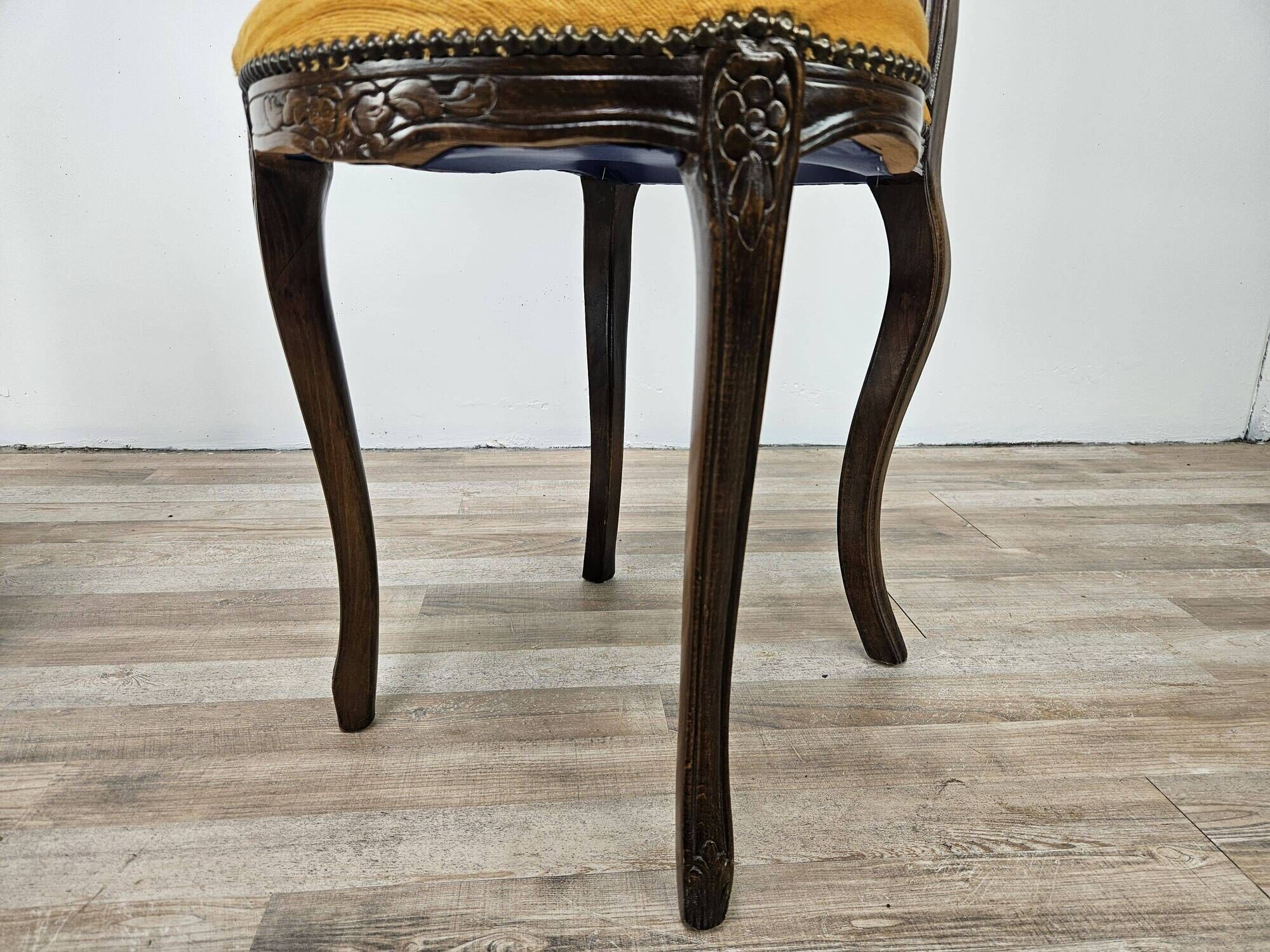 Pair of early 1900s wooden chairs with padded seat and backrests