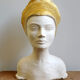 Plaster bust of a woman