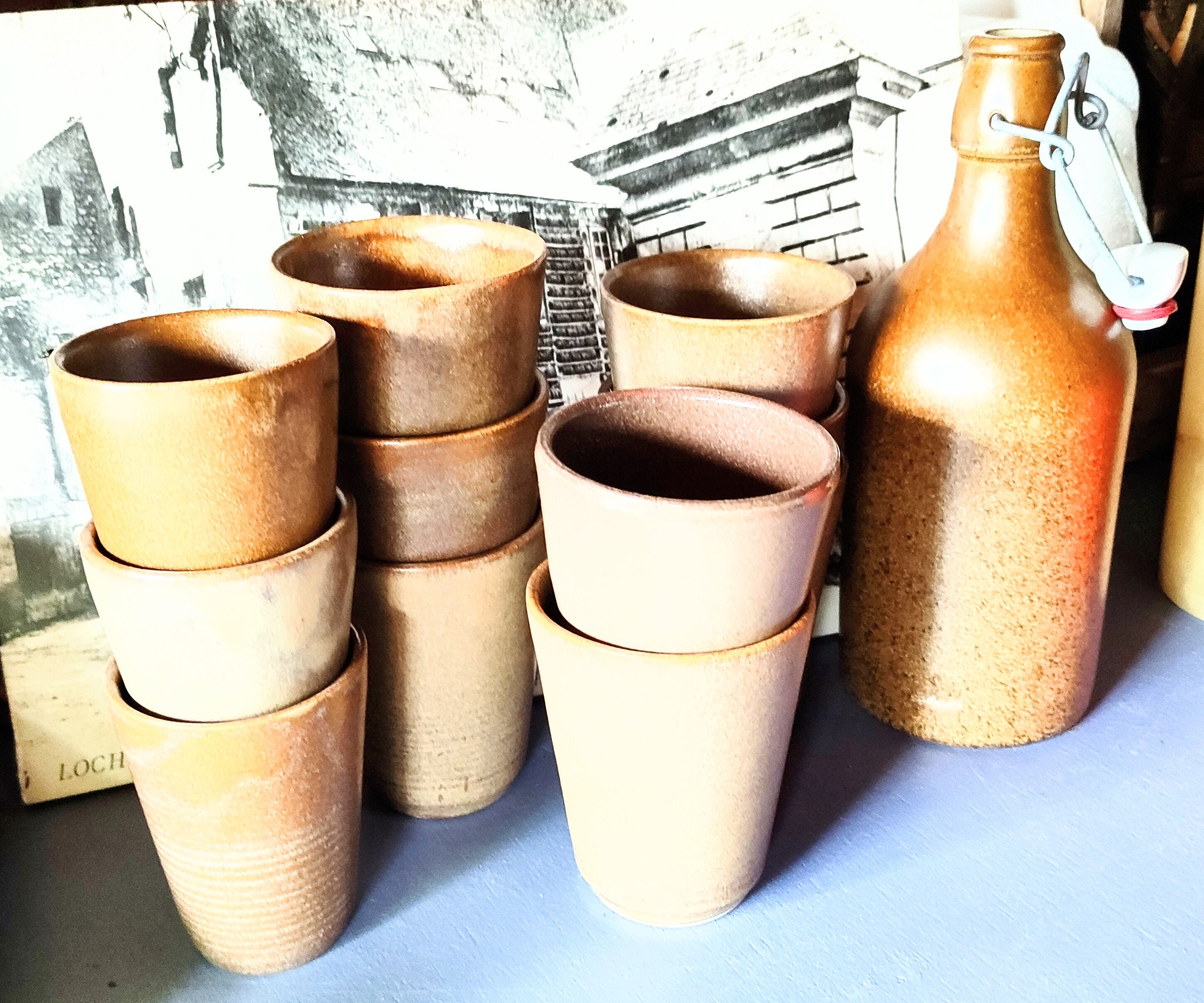 Set of Digoin stoneware cups or glasses