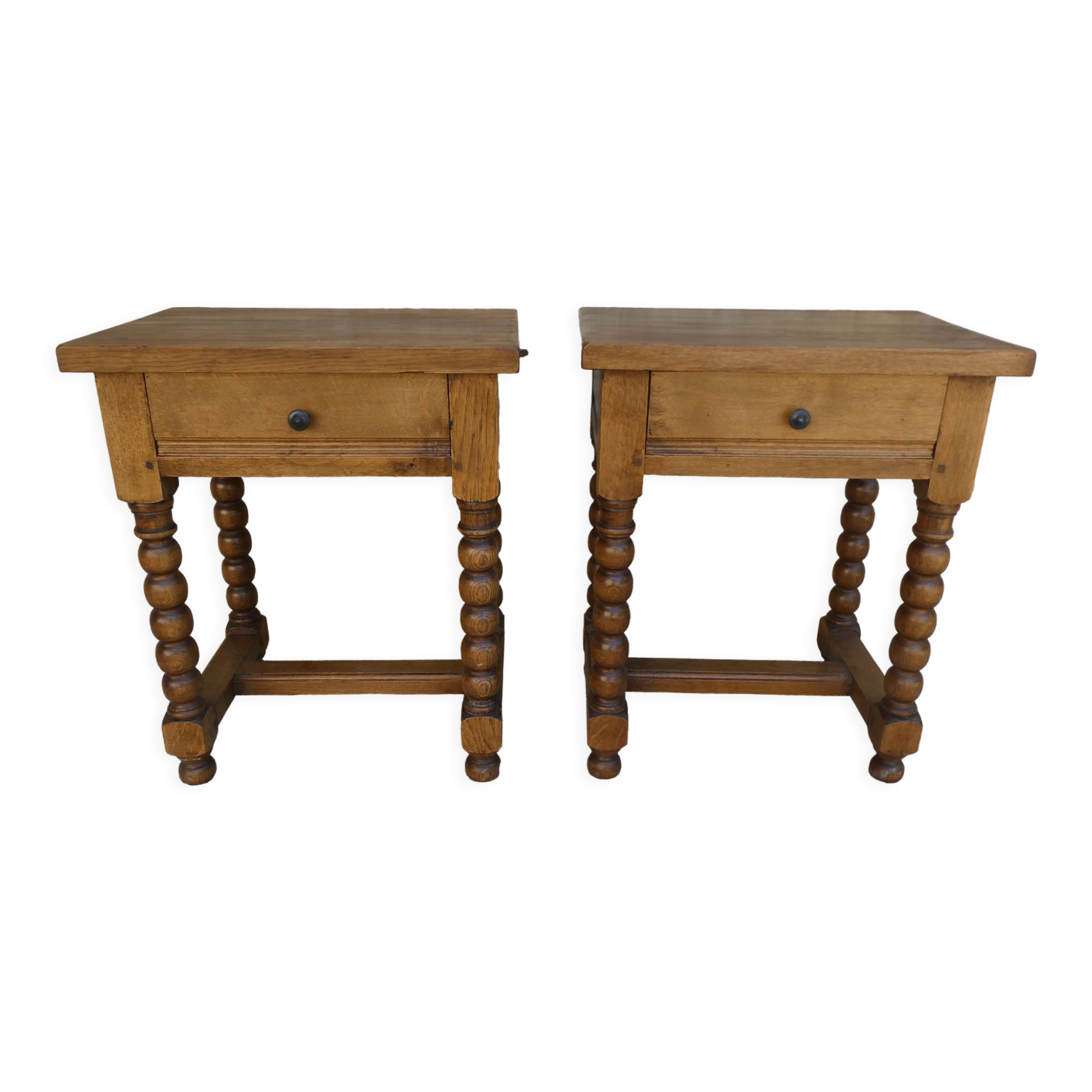 Pair of solid oak bedside tables with carved legs