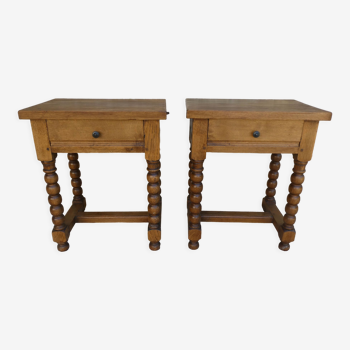 Pair of solid oak bedside tables with carved feet