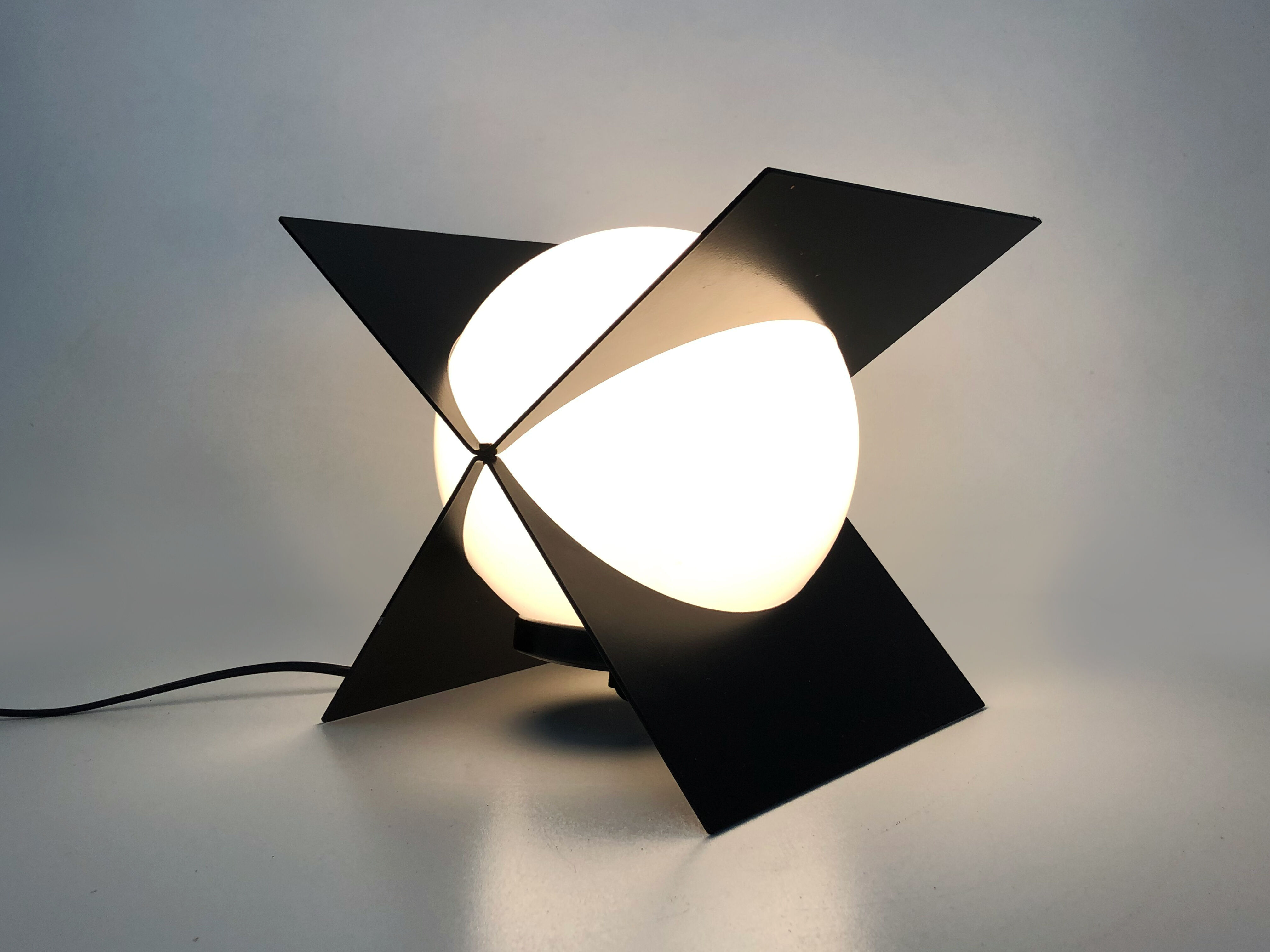 Lamp Luz Eva Maison Gautier structure in black metal and globe in white plastic