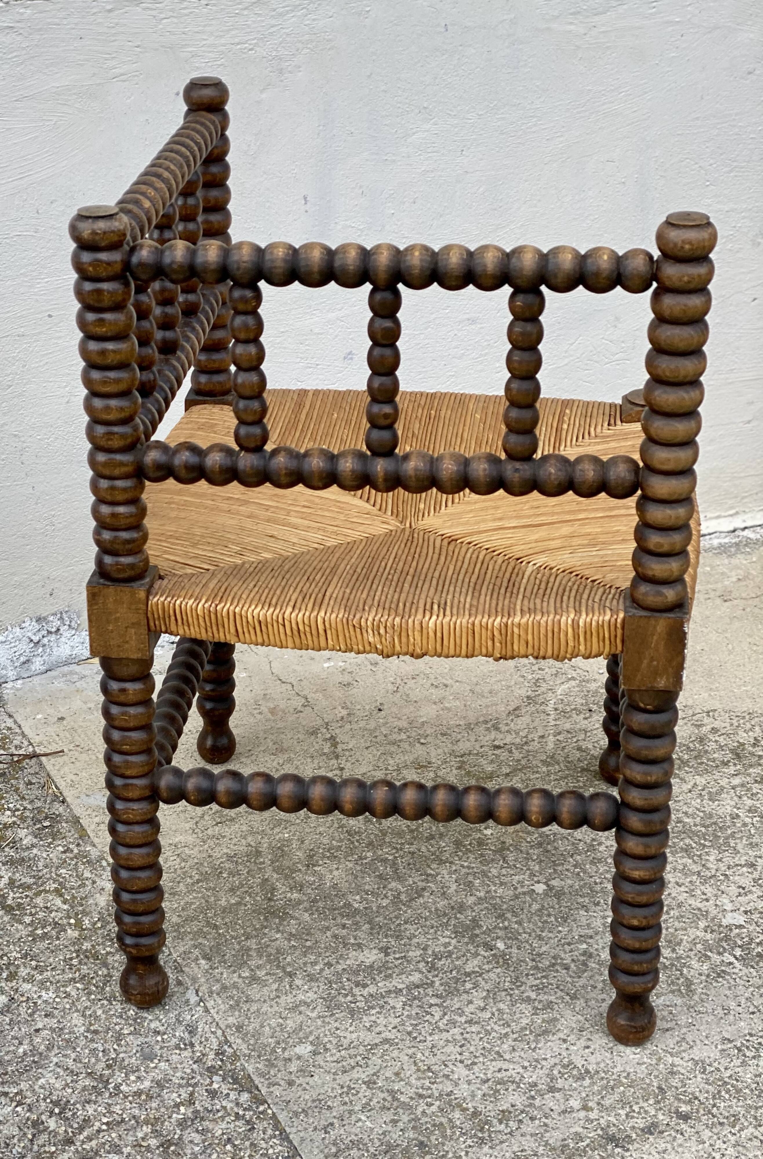 Art Deco turned wood straw corner armchair