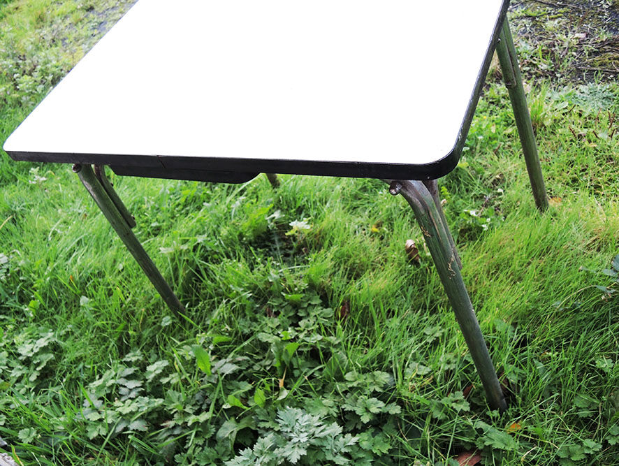 Old extendable table in yellow formica