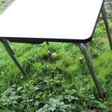 Old extendable table in yellow formica