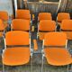 Sérié 39 chaises 4 fauteuils DSC 106 en tissu orange par Giancarlo Piretti pour Castelli