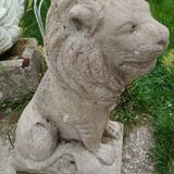 Paire de lions de jardin en pierre ancien vintage