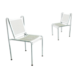 Pair of mid century perforated steel stacking chairs