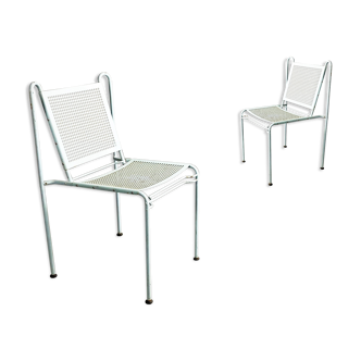 Pair of mid century perforated steel stacking chairs