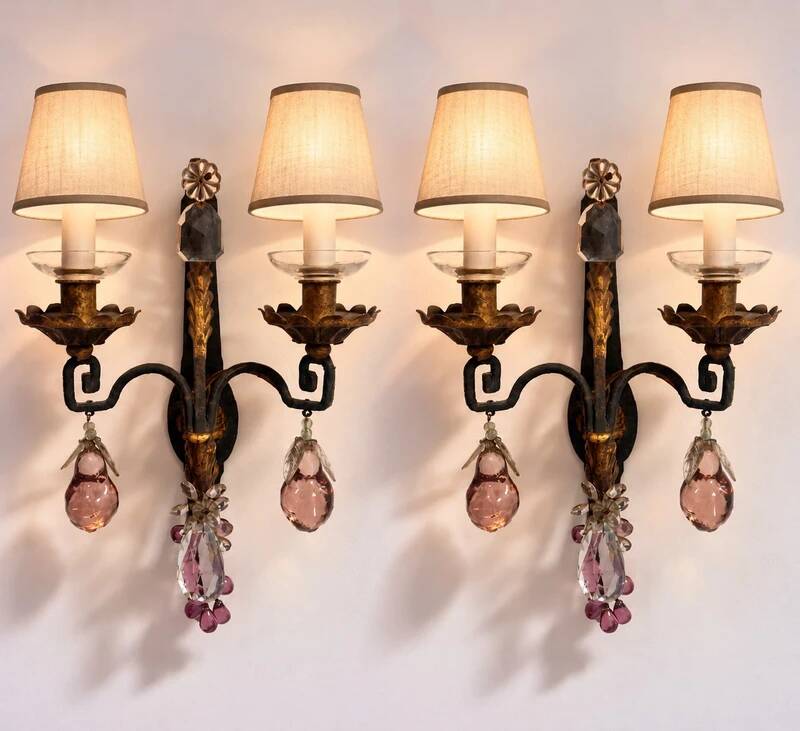 Maison Baguès, pair of wall sconces in wrought iron and gilded sheet metal, crystal pendants.