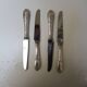 4 anciens couteaux de table en inox Grossmann
