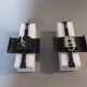 Pair of modernist sconces in black metal and white opaline vintage