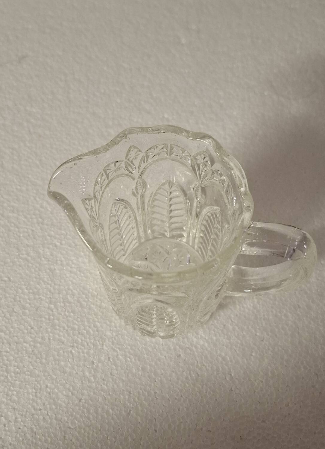 Moulded glass cream pot
