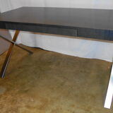 Flat office with metal feet of the 80s