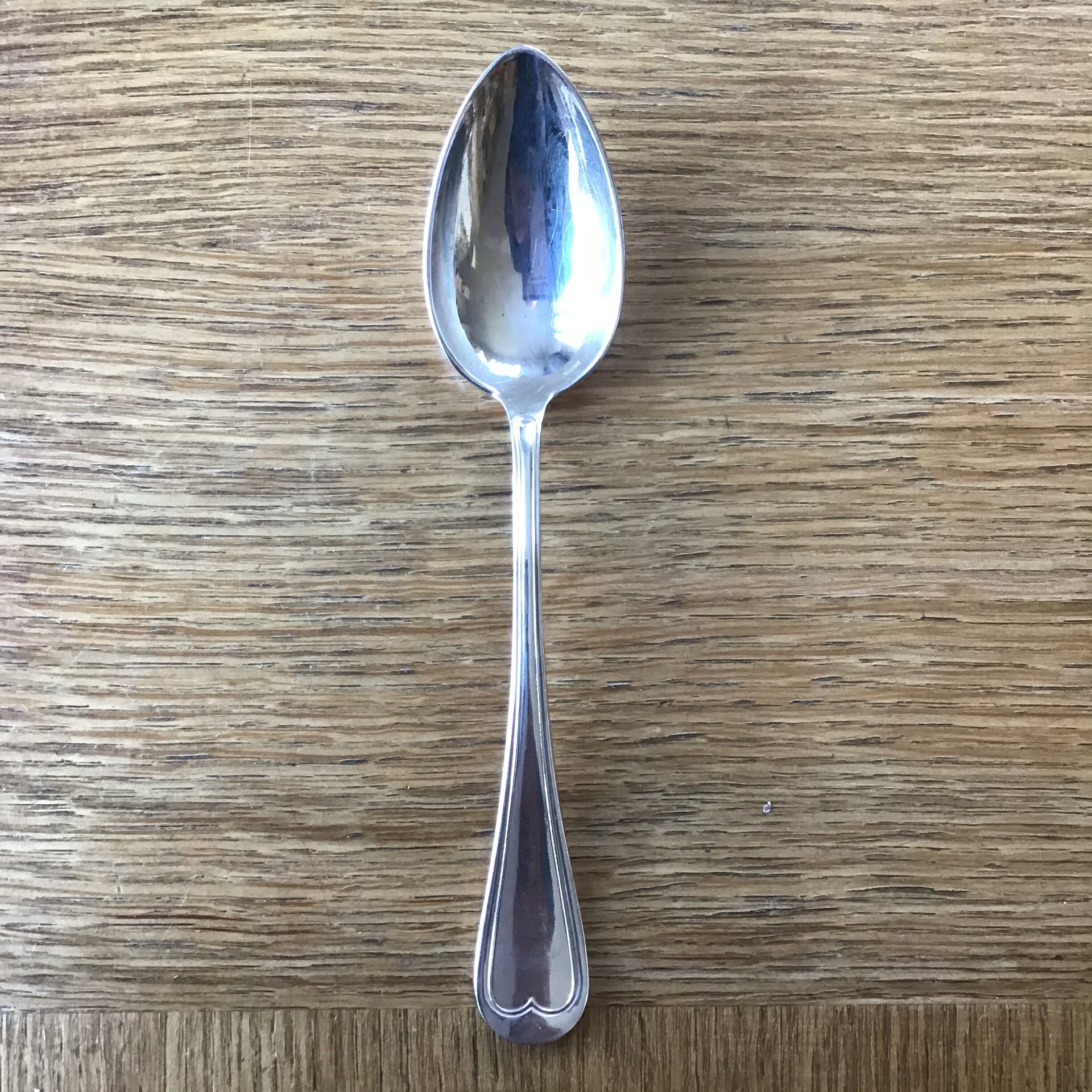 Set of 12 silver metal in their wallet