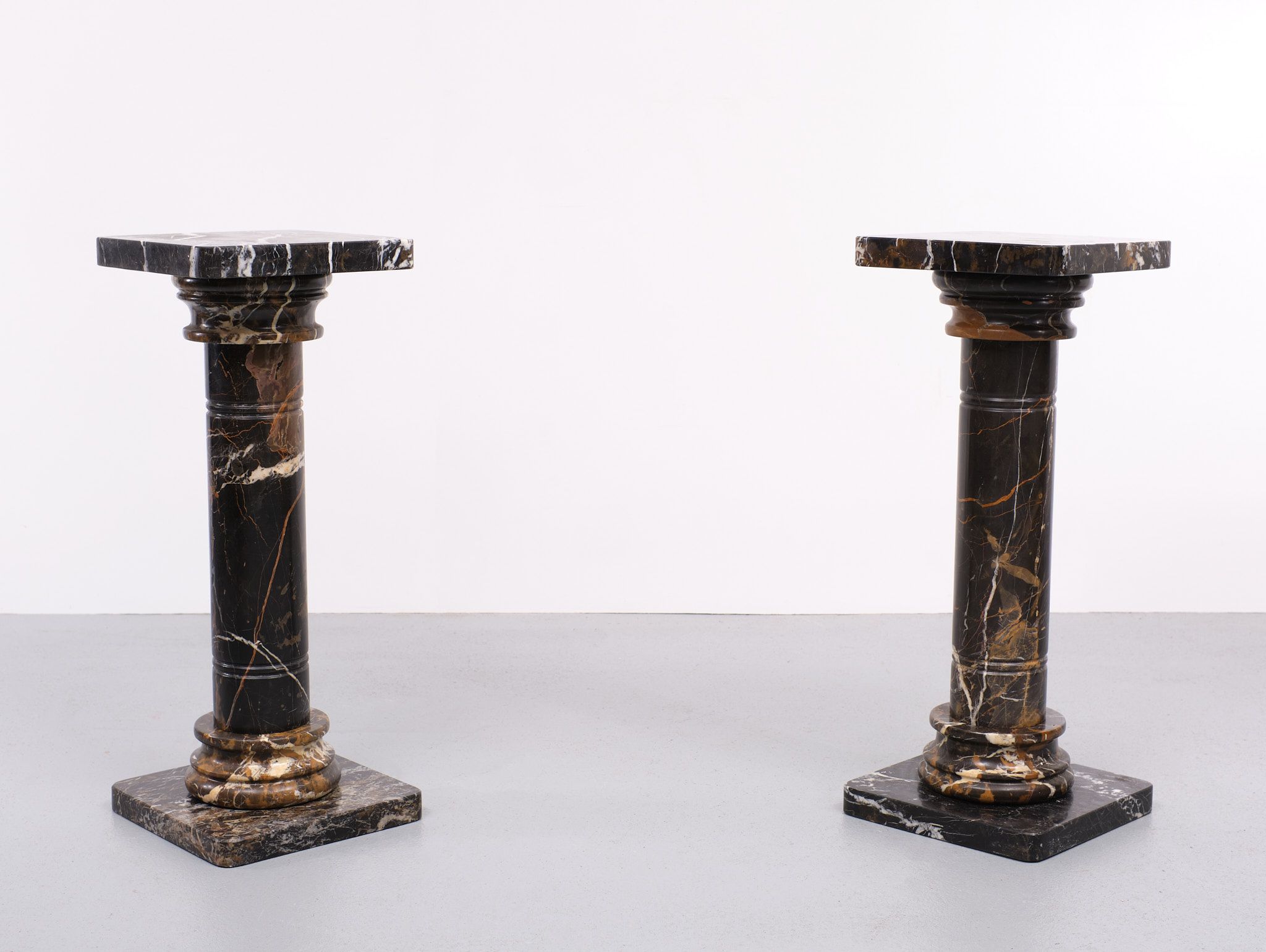 Two black portoro marble pedestals, Italy
