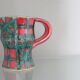 Vintage pitcher red and green art pottery