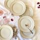 Set of 6 antique off-white porcelain dessert plates with gold trim