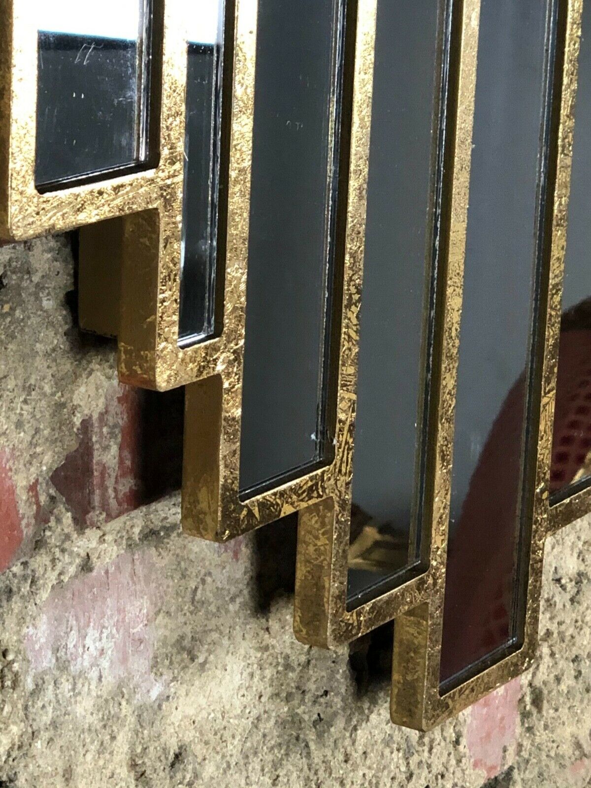 Art deco style "miami" mirror in patinated gilded wood 80x52cm
