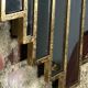 Art deco style "miami" mirror in patinated gilded wood 80x52cm