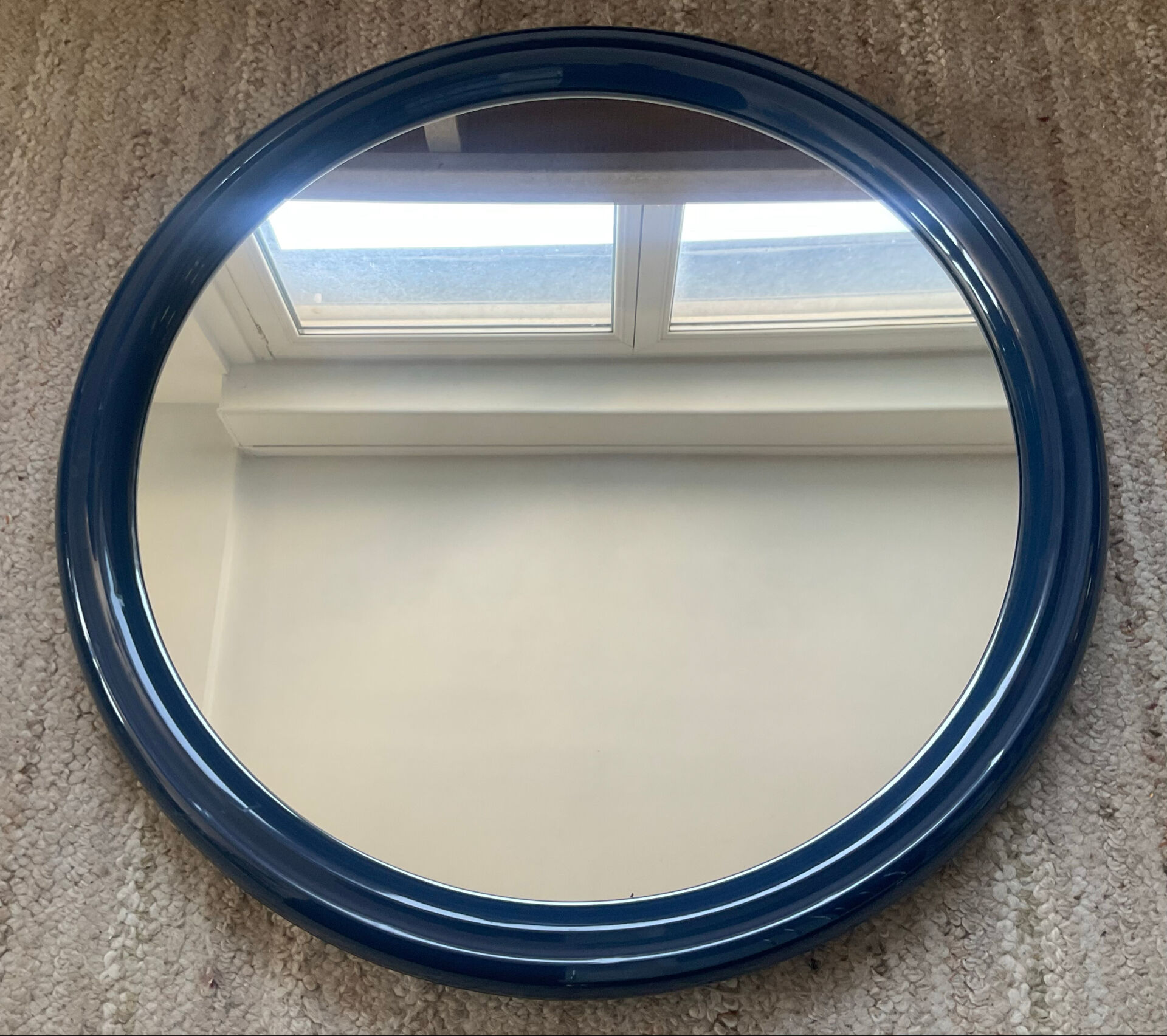 Round Tiger mirror from the 1970s.