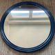 Round Tiger mirror from the 1970s.
