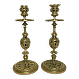 Pair of bronze torches chiseled with foliage, 19th century