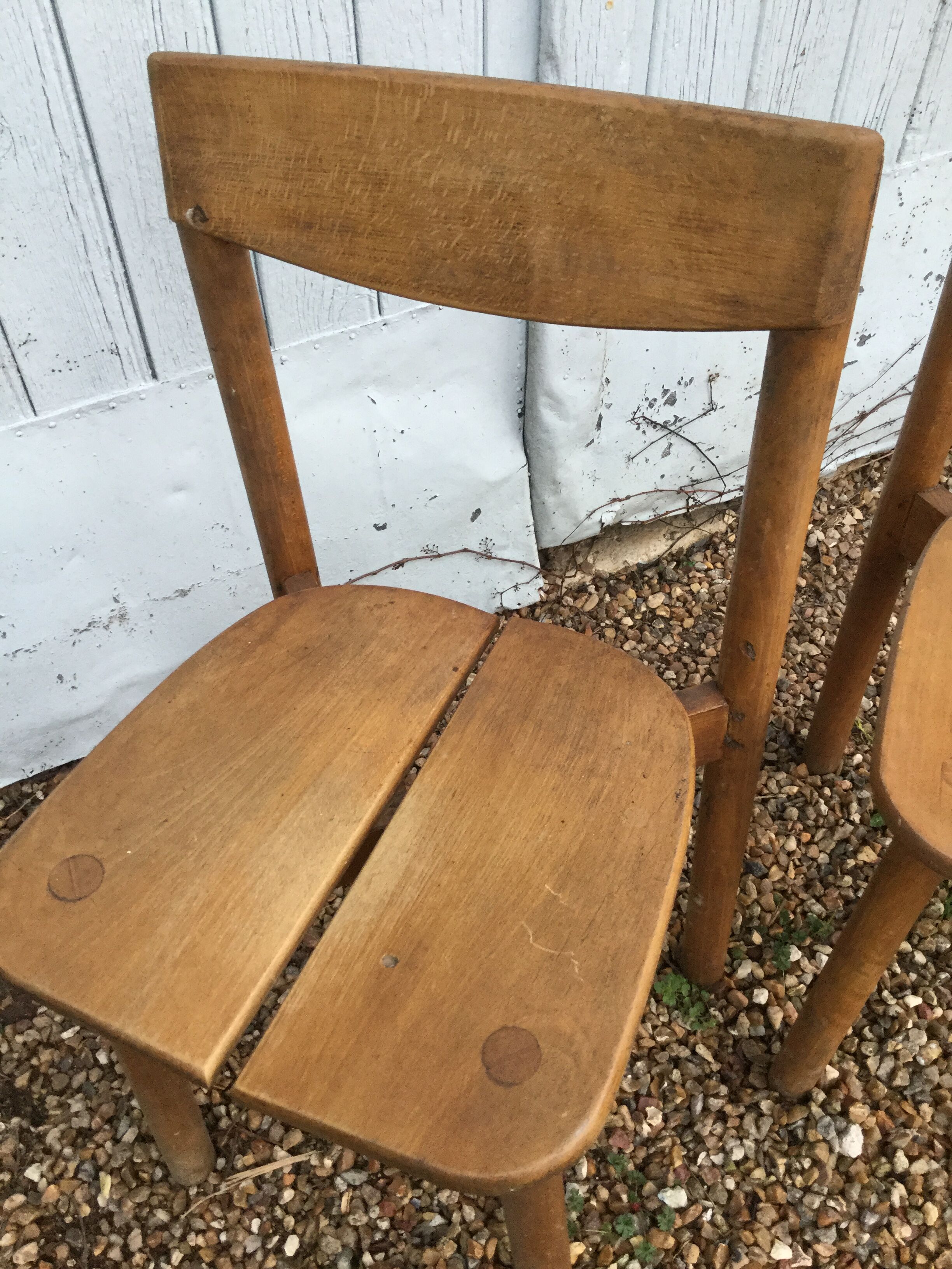 A pair of Chair grain of Café Pierre Gautier - Delaye