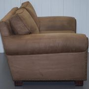 Ralph Lauren Jamaica velvet sofa pair with feather cushions.