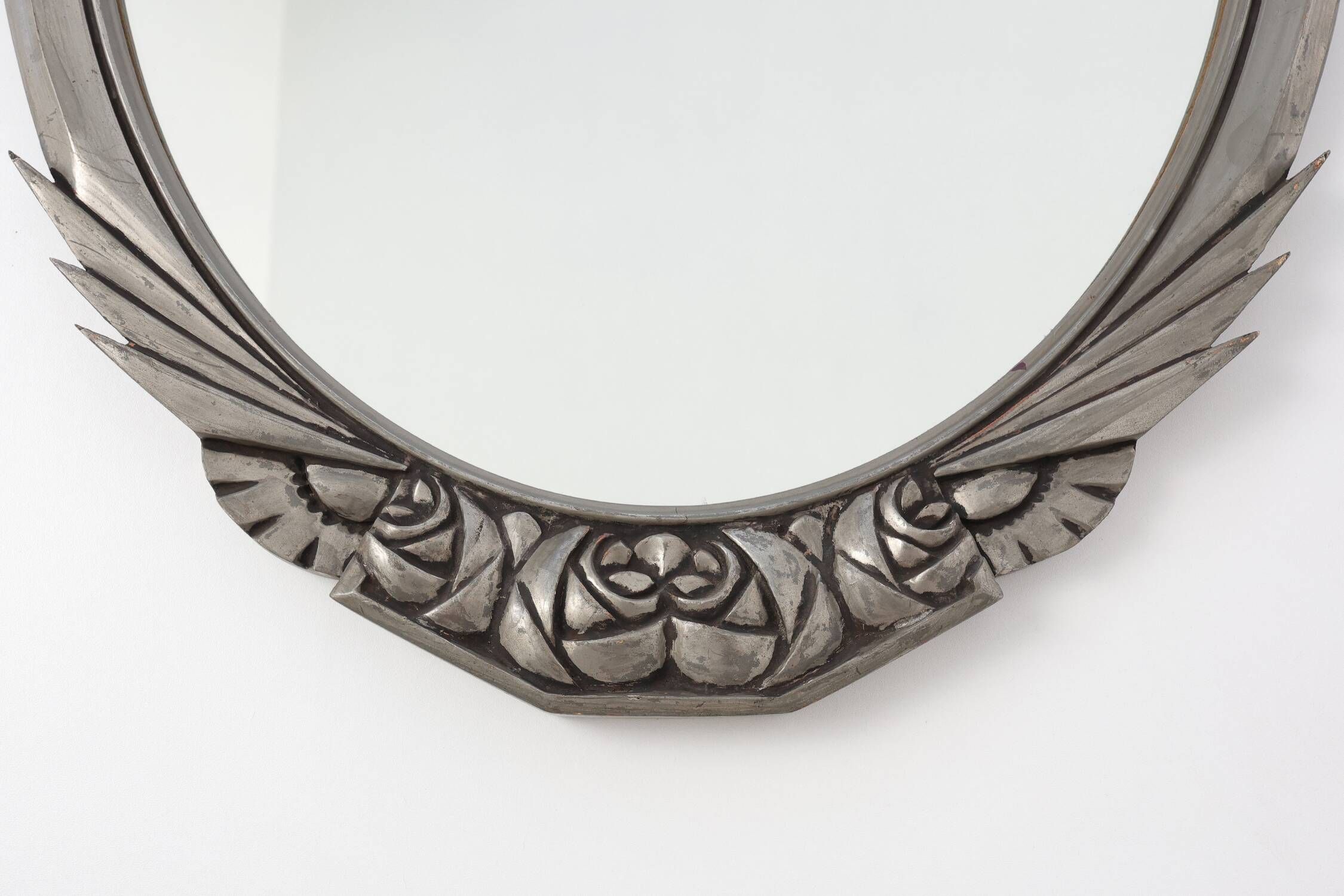 French Art Deco Oval Mirror with Carved Roses and Silver-Painted Frame