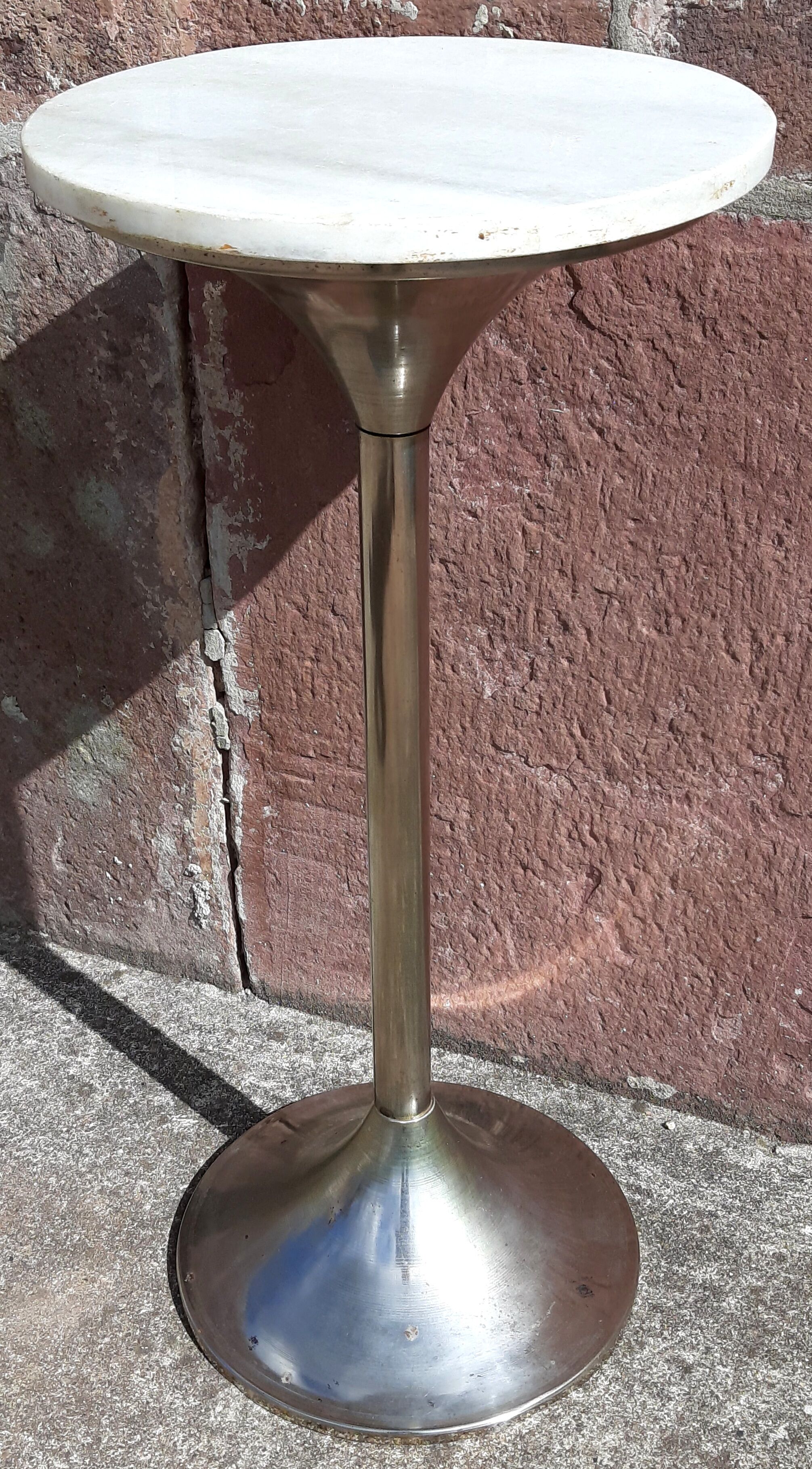 Golden metal selette on marble