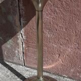 Golden metal selette on marble