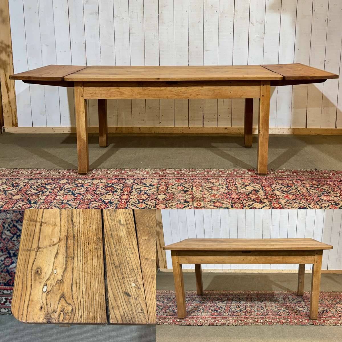 Extendable oak table from the 1930s with Gothic decoration.