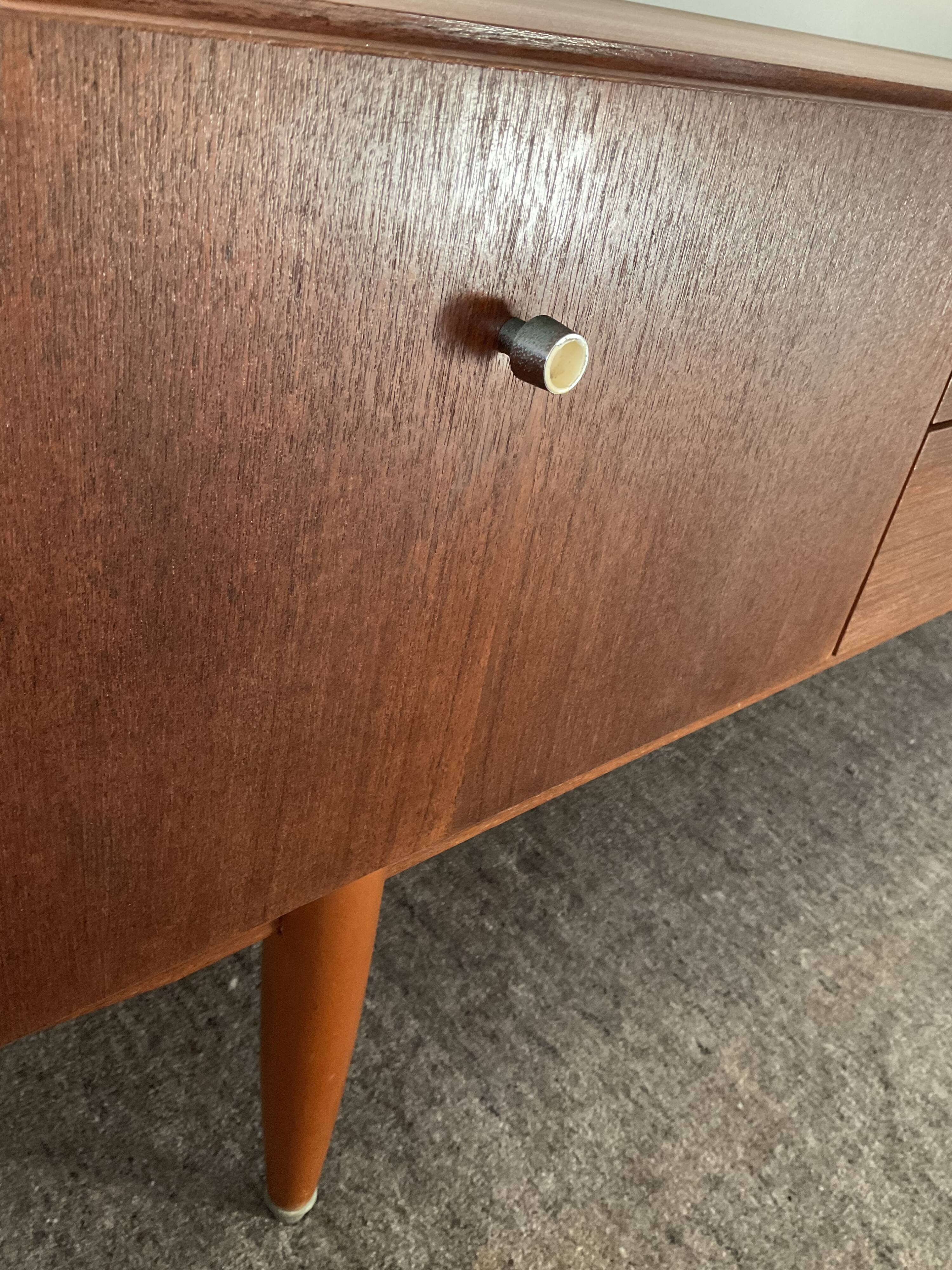 Scandinavian teak row from the 60s and 70s