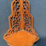 Old wall corner shelf in cut wood from the 1900s