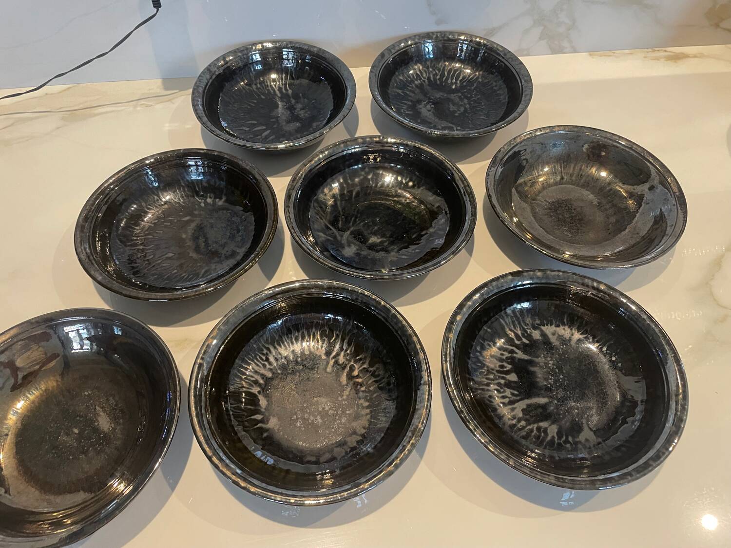 Vallauris service, the pottery of the great oak. Black metal glazed ceramics.