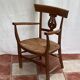 Light wood armchair seated in vintage straw dimension: height -78cm- width -54cm-