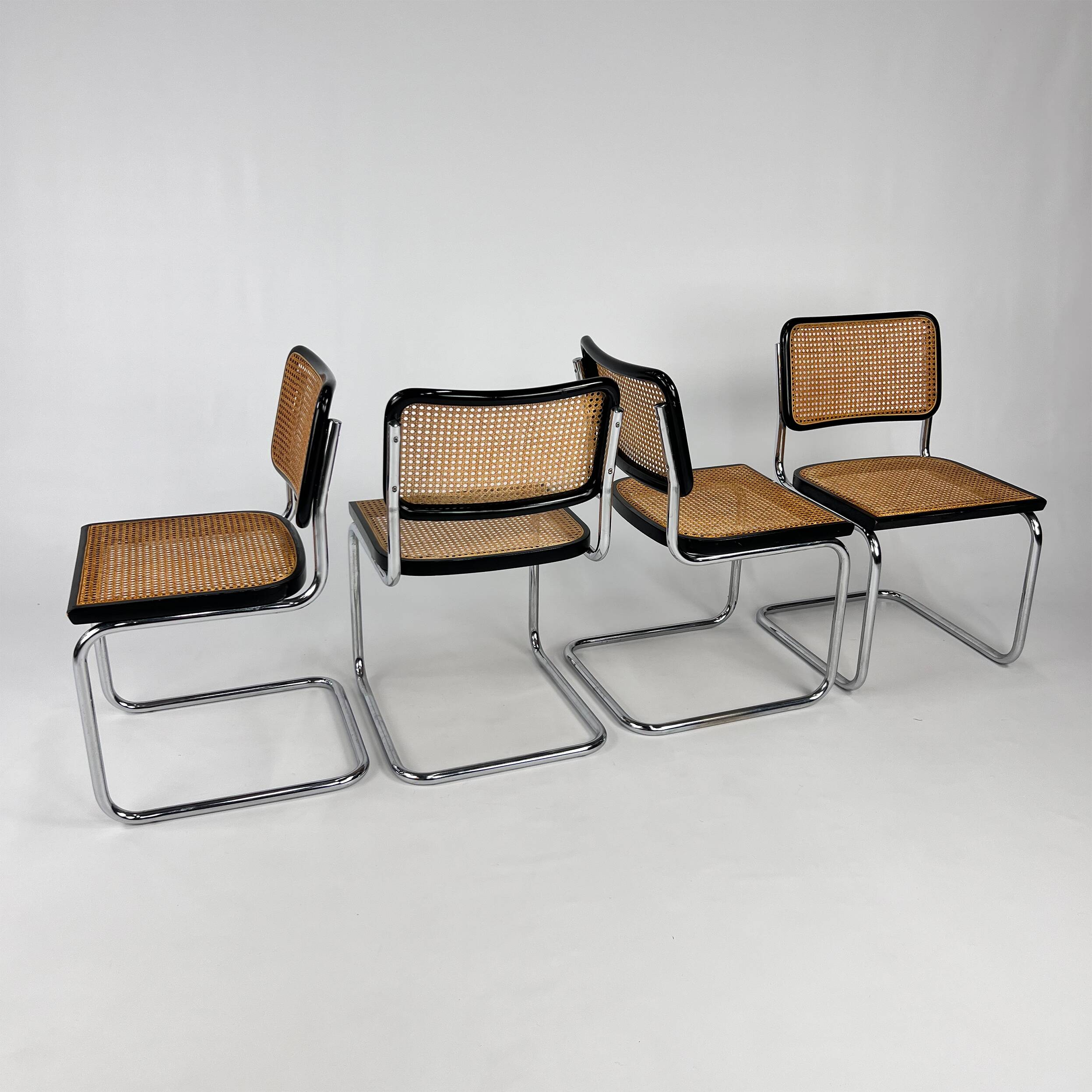 Set of 4 Tubular Frame and Cane Cantilever dining chairs, Italy, 1970s