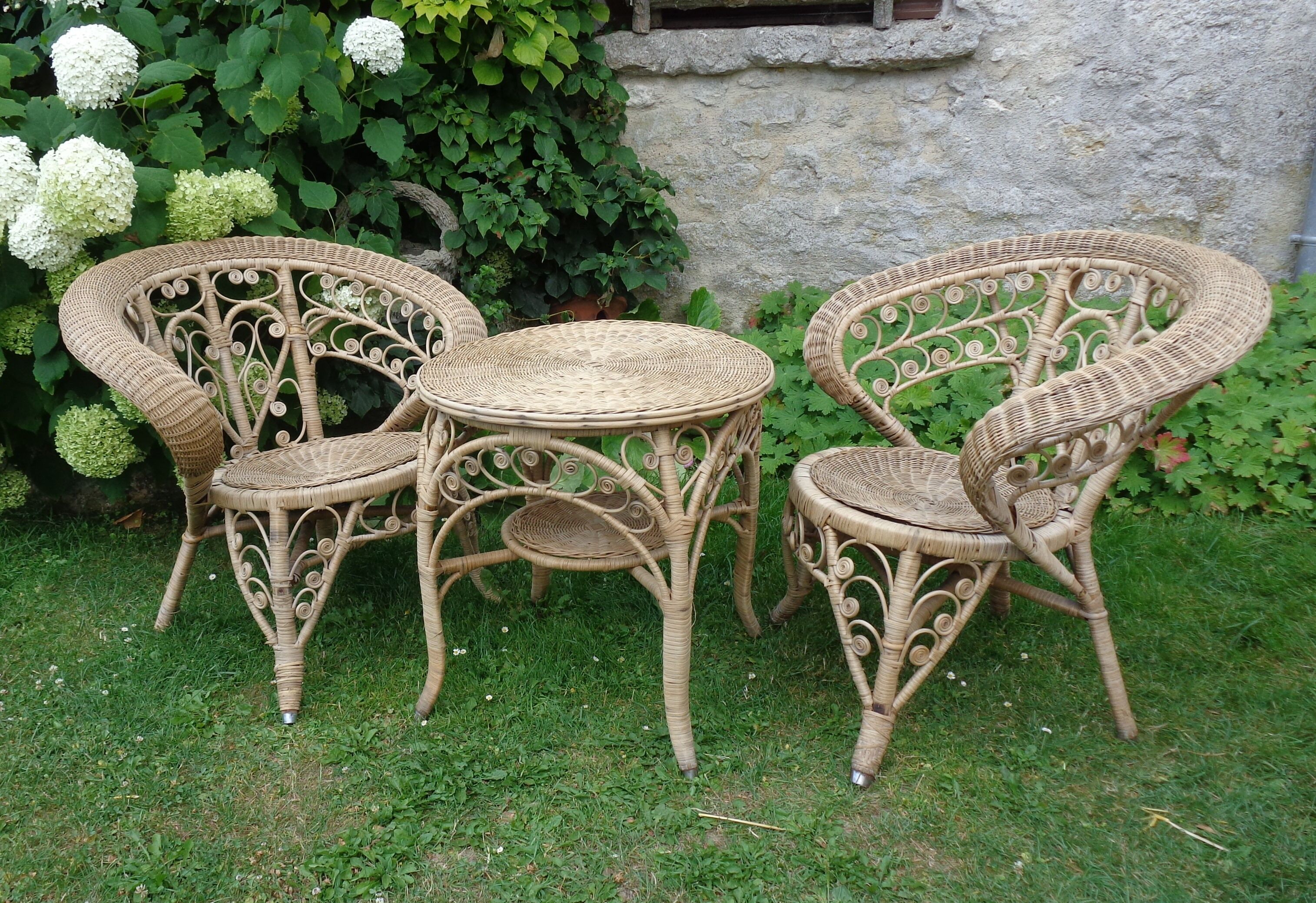 Pair of vintage rattan peacock armchairs